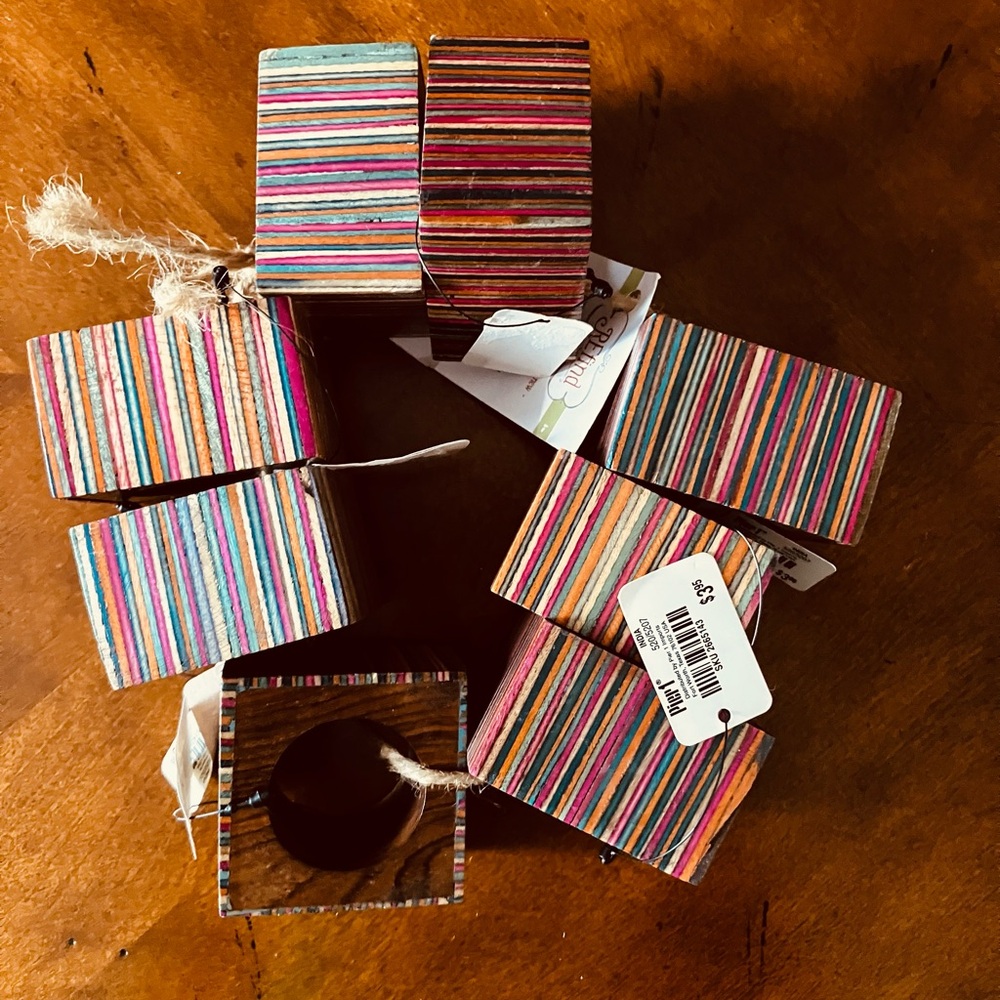 Set of 8 Multicolored Striped Wooden Napkin Rings. Napkin is not included.